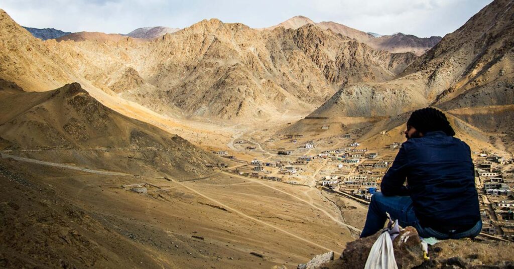 man wearing heavy down jacket in Ladakh