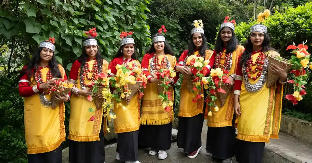 Khasi women in traditional Jainsem dress and silver headgear during a Meghalaya festival